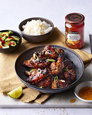 Sticky Marmalade chicken wings with rice and a cucumber and corriander salad